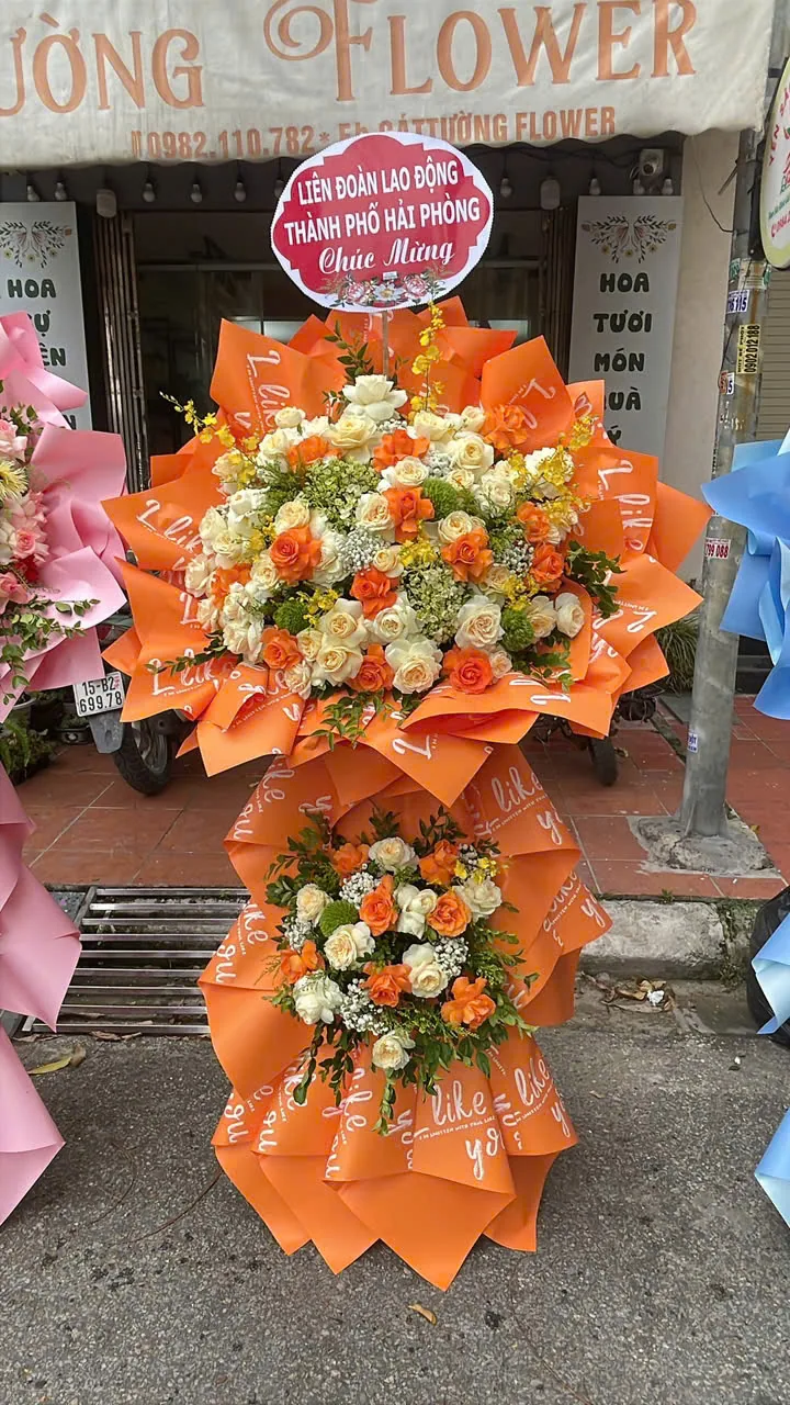 Lẵng hoa khai trương tông cam vàng