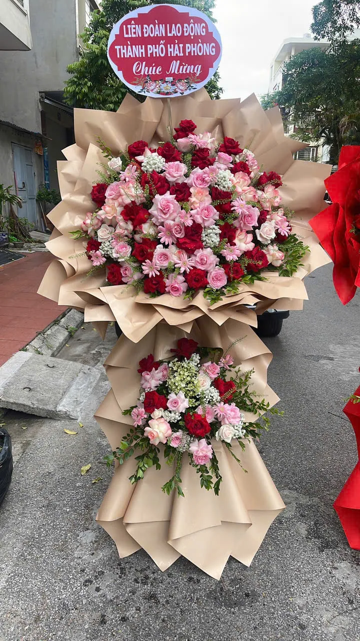 Lẵng hoa khai trương tông be hồng nhạt