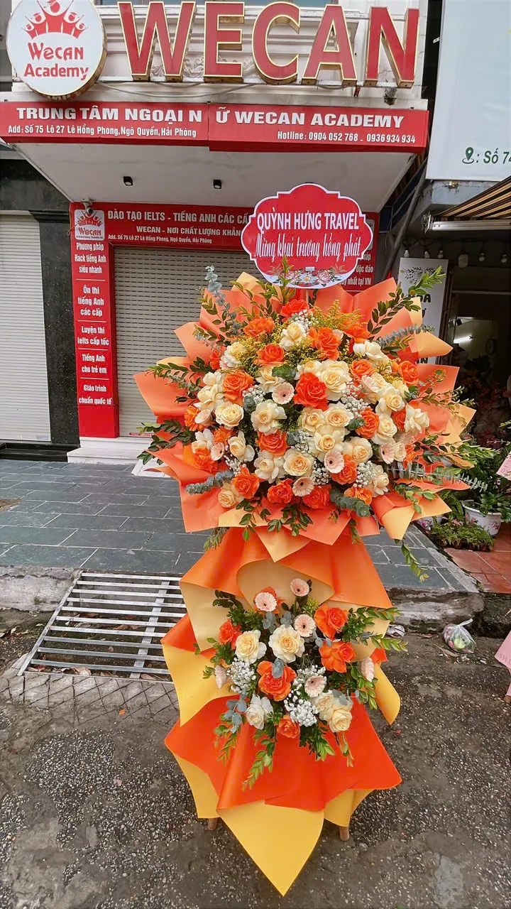 Lẵng hoa khai trương tông cam vàng